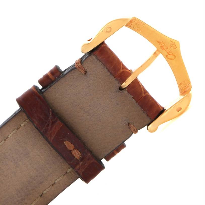 The image shows a close-up of the buckle and strap of a Cartier Tank Louis W1529756 Men's Yellow Gold Silver Dial W1529756 Men's Yellow Gold Silver Dial watch.