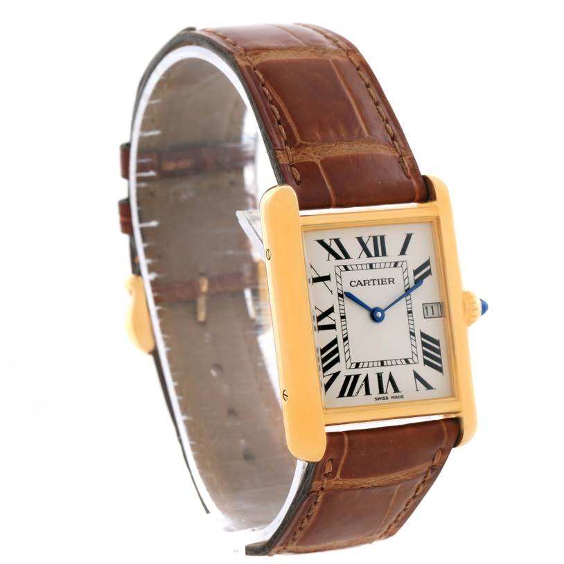 The image shows a Cartier Tank Louis W1529756 Men's Yellow Gold Silver Dial W1529756 Men's Yellow Gold Silver Dial watch angled from the front-left, highlighting the gold case, Roman numeral dial, and brown leather strap.