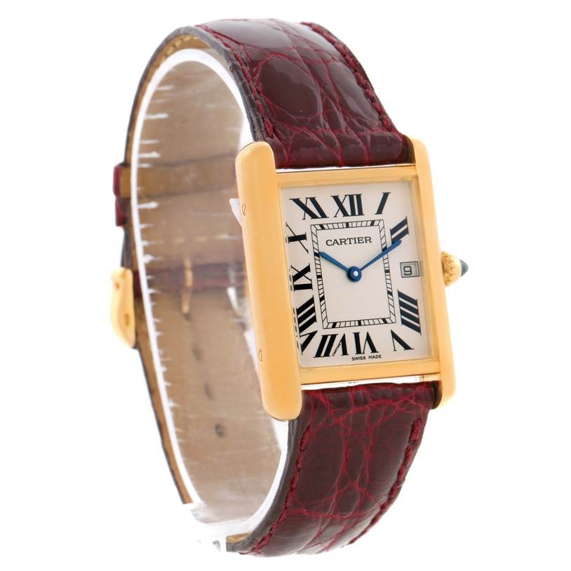 The image shows a Cartier Tank Louis W1529756 Men's Yellow Gold Silver Dial W1529756 Men's Yellow Gold Silver Dial wristwatch at an oblique angle, featuring its rectangular gold case, Roman numeral dial, and brown leather strap.