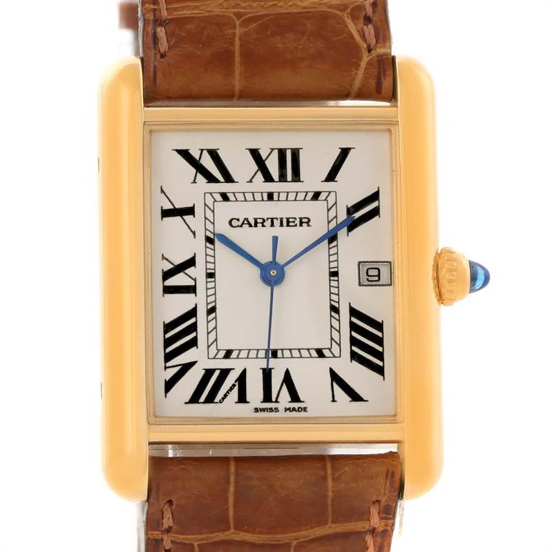 The image shows a Tank Louis Cartier watch from the front, highlighting its rectangular dial, brown leather strap, and blue hands.