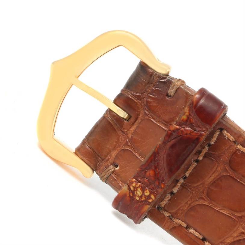 The image shows the buckle and part of the leather strap of a Cartier Tank Louis W1529756 Men's Yellow Gold Silver Dial W1529756 Men's Yellow Gold Silver Dial watch.