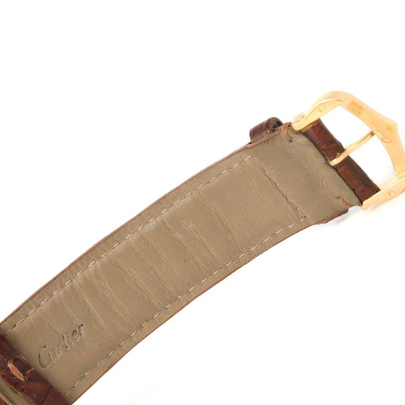 This image shows the underside of a Cartier Tank Louis W1529756 Men's Yellow Gold Silver Dial W1529756 Men's Yellow Gold Silver Dial model watch strap, highlighting the stitching and clasp.