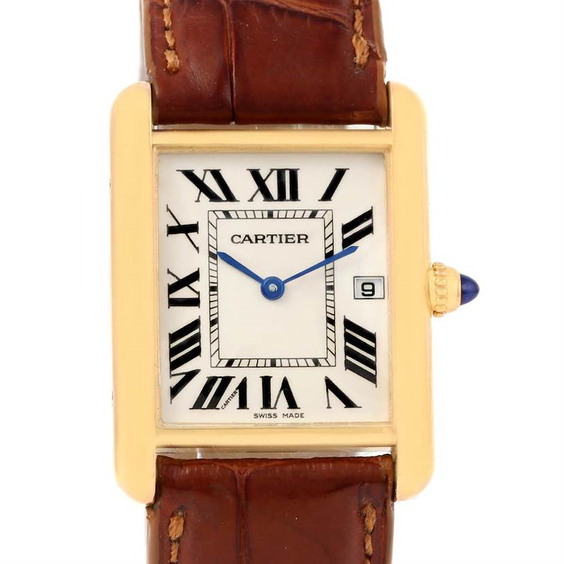 The image shows the face of a Cartier Tank Louis watch, highlighting its rectangular dial, Roman numerals, and leather strap.