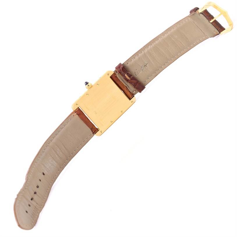 The image shows the rear view of a Cartier Tank Louis W1529756 Men's Yellow Gold Silver Dial W1529756 Men's Yellow Gold Silver Dial watch with its full leather strap and clasp.