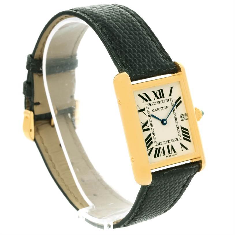 The image shows a Cartier Tank Louis W1529756 Men's Yellow Gold Silver Dial W1529756 Men's Yellow Gold Silver Dial watch from a front-left angle, featuring its rectangular face, Roman numerals, leather strap, and gold casing.