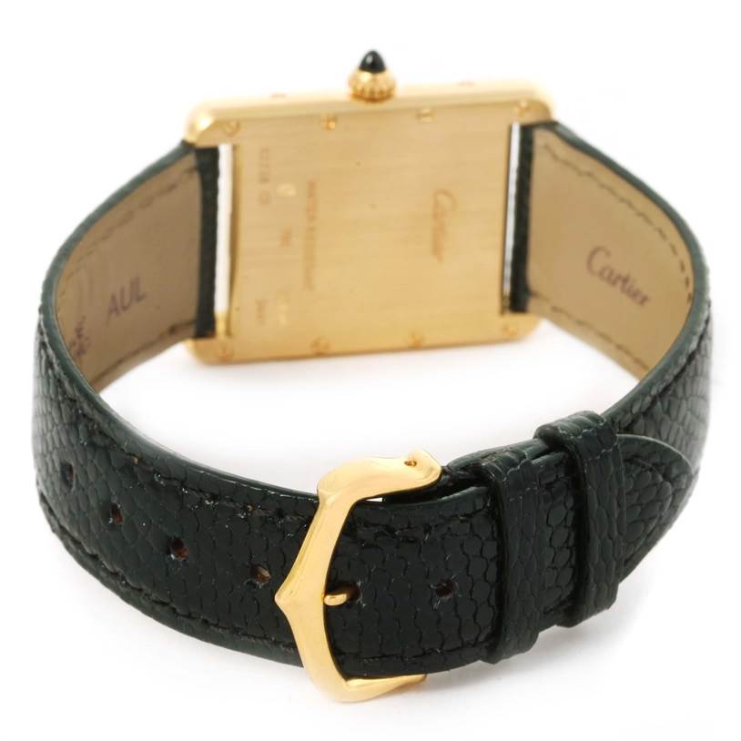 The image shows the back and clasp of the Cartier Tank Louis W1529756 Men's Yellow Gold Silver Dial W1529756 Men's Yellow Gold Silver Dial watch, highlighting its strap and buckle.