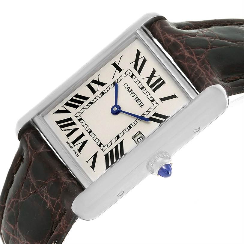 The image shows a Tank Louis model by Cartier at an angle highlighting the rectangular face, Roman numerals, blue hands, and brown leather strap.