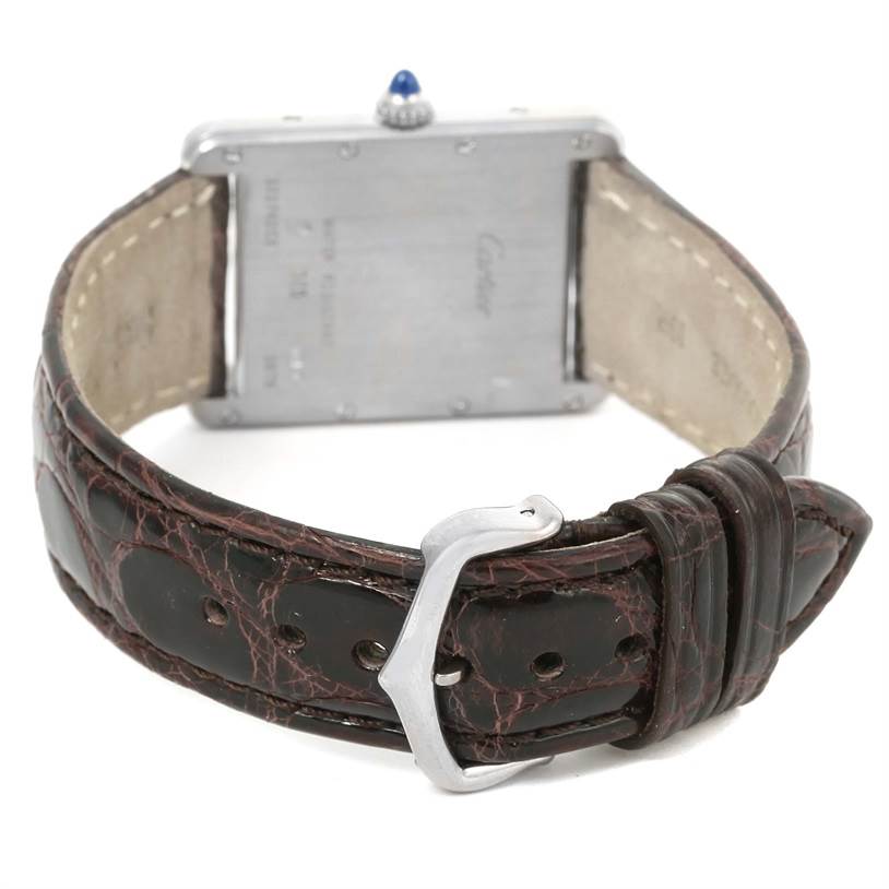 The image shows the back view of a Cartier Tank Louis W1540956 Men's White Gold Silver Dial W1540956 Men's White Gold Silver Dial watch, highlighting the buckle and leather strap.