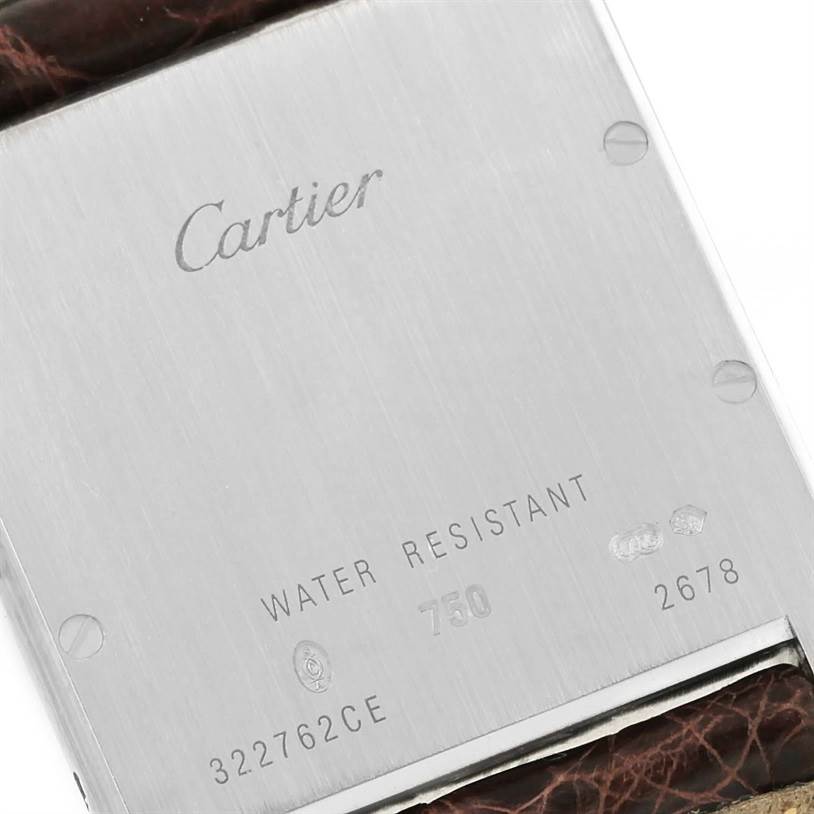 This is the back of the Cartier Tank Louis W1540956 Men's White Gold Silver Dial W1540956 Men's White Gold Silver Dial watch, showcasing the brand name, model number, and other inscriptions.