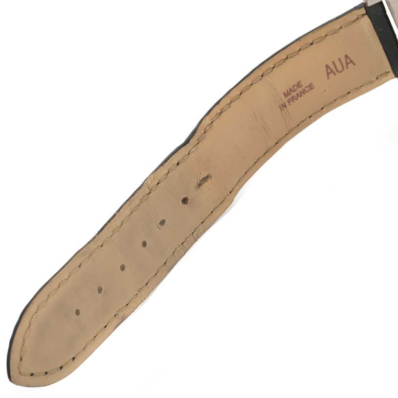 The image shows a close-up of the leather strap of a Tank Louis model by Cartier.