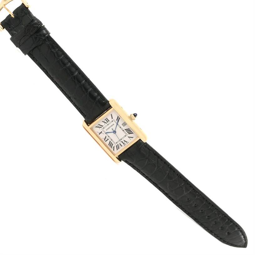 This image shows a Tank Louis watch by Cartier, displaying the entire watch including the face, strap, and buckle.