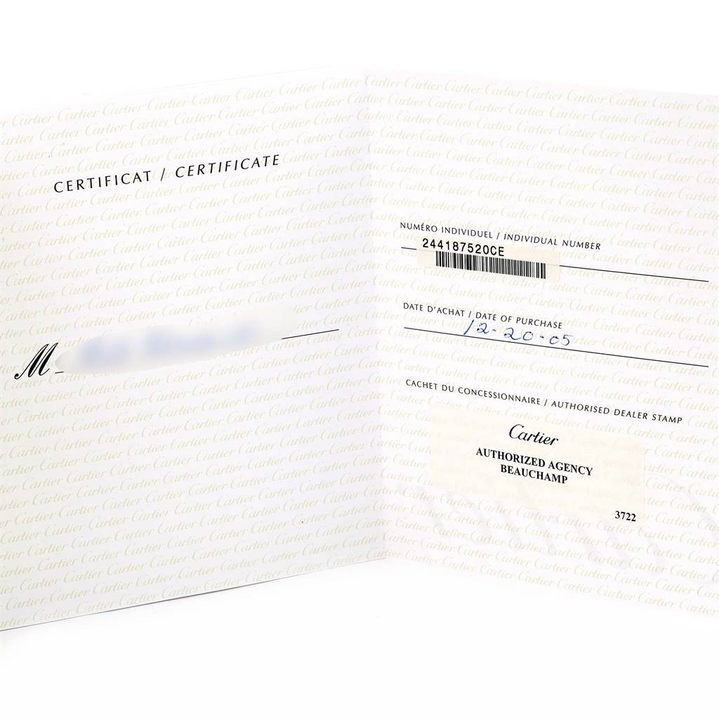 This image shows the certificate or warranty card for the Tank Louis model by Cartier, displaying purchase details and authorization.