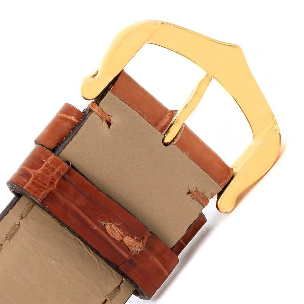 The image shows the buckle and leather strap of the Cartier Tank Louis W1529756 Men
s Yellow Gold Silver Dial W1529756 Men
s Yellow Gold Silver Dial watch, viewed from the top.