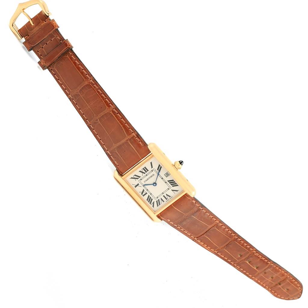 This image shows the front view of a Cartier Tank Louis W1529756 Yellow Gold Silver Dial W1529756 Yellow Gold Silver Dial watch with a brown leather strap and rectangular dial.