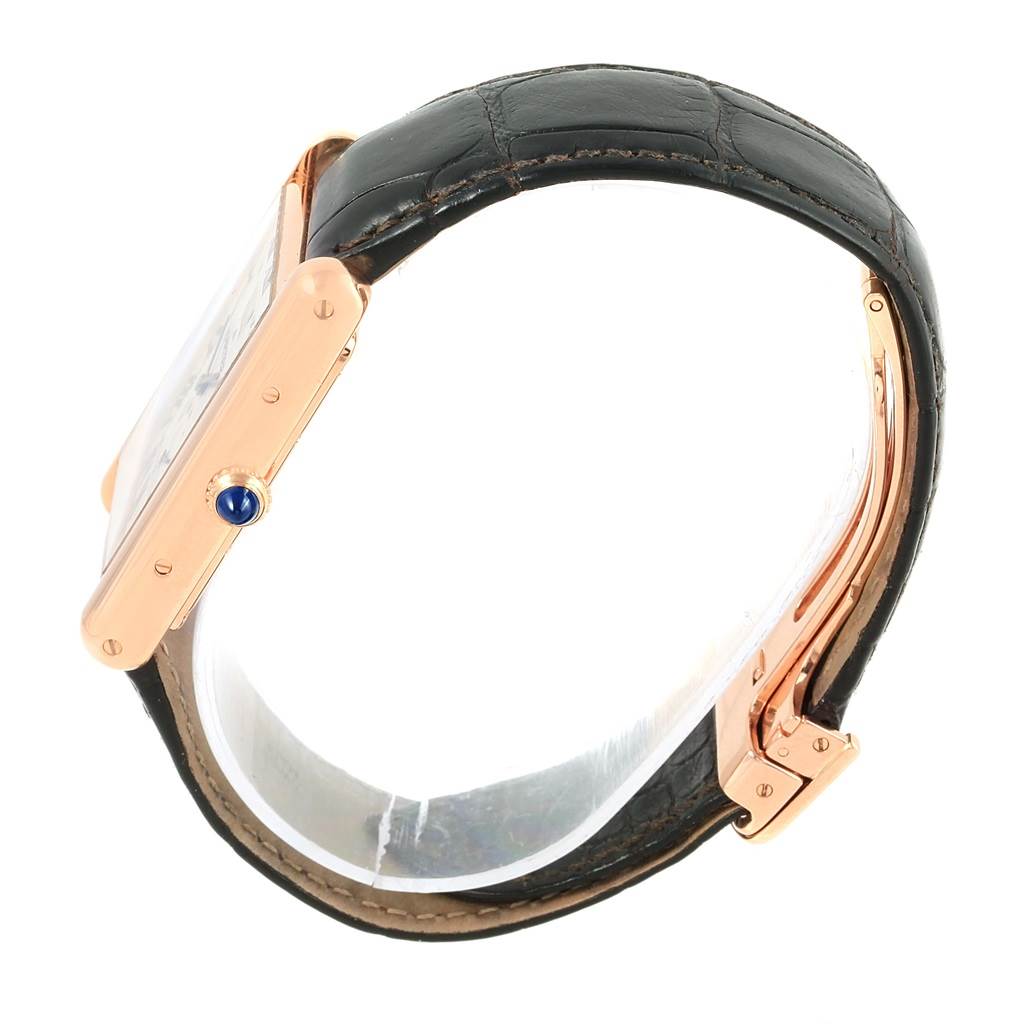 The image shows a side view of the Cartier Tank Louis W1560003 Men's Rose Gold Silver Dial W1560003 Men's Rose Gold Silver Dial watch, highlighting its case, crown, and strap.