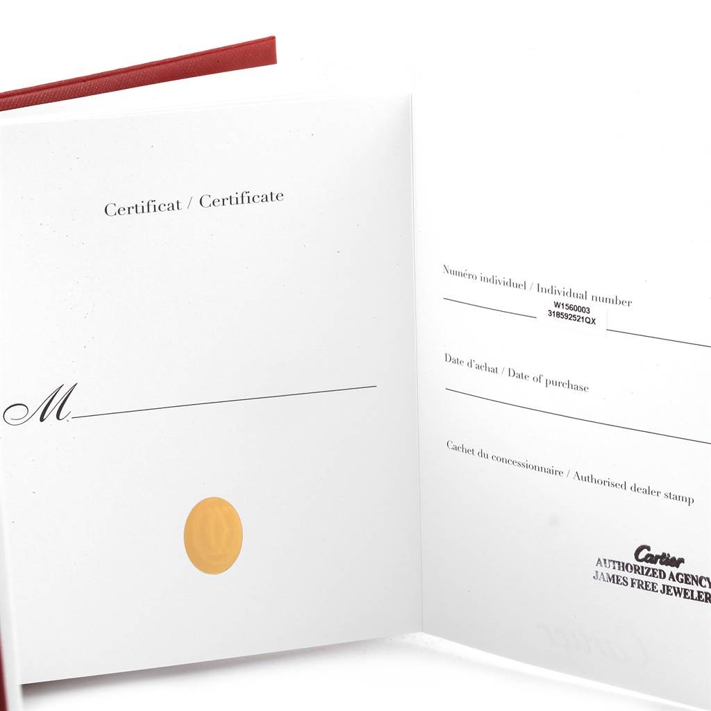 The image shows a certificate booklet for the Cartier Tank Louis W1560003 Men's Rose Gold Silver Dial W1560003 Men's Rose Gold Silver Dial watch model, open to reveal certification details.