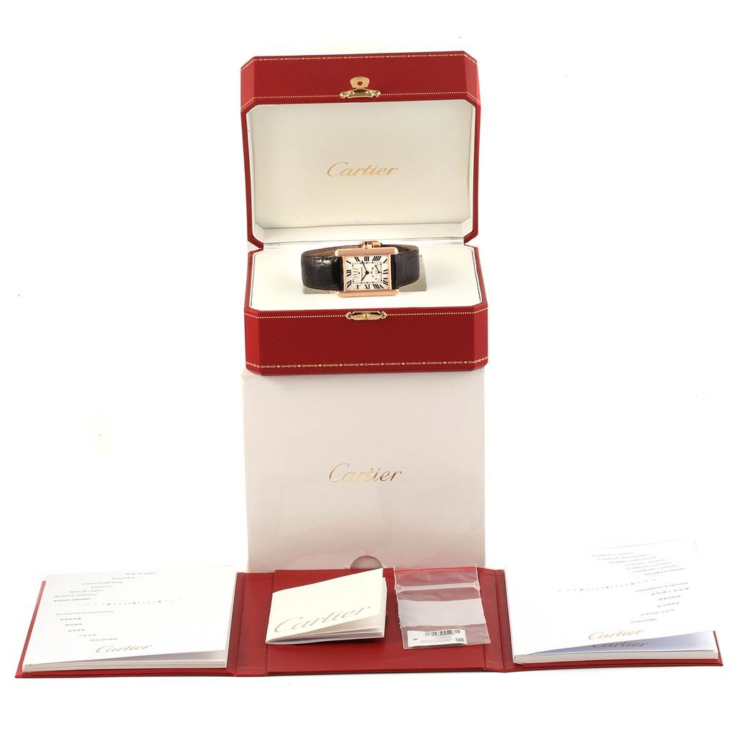 The image shows a Cartier Tank Louis W1560003 Men's Rose Gold Silver Dial W1560003 Men's Rose Gold Silver Dial watch in its open case with accompanying documents and accessories.