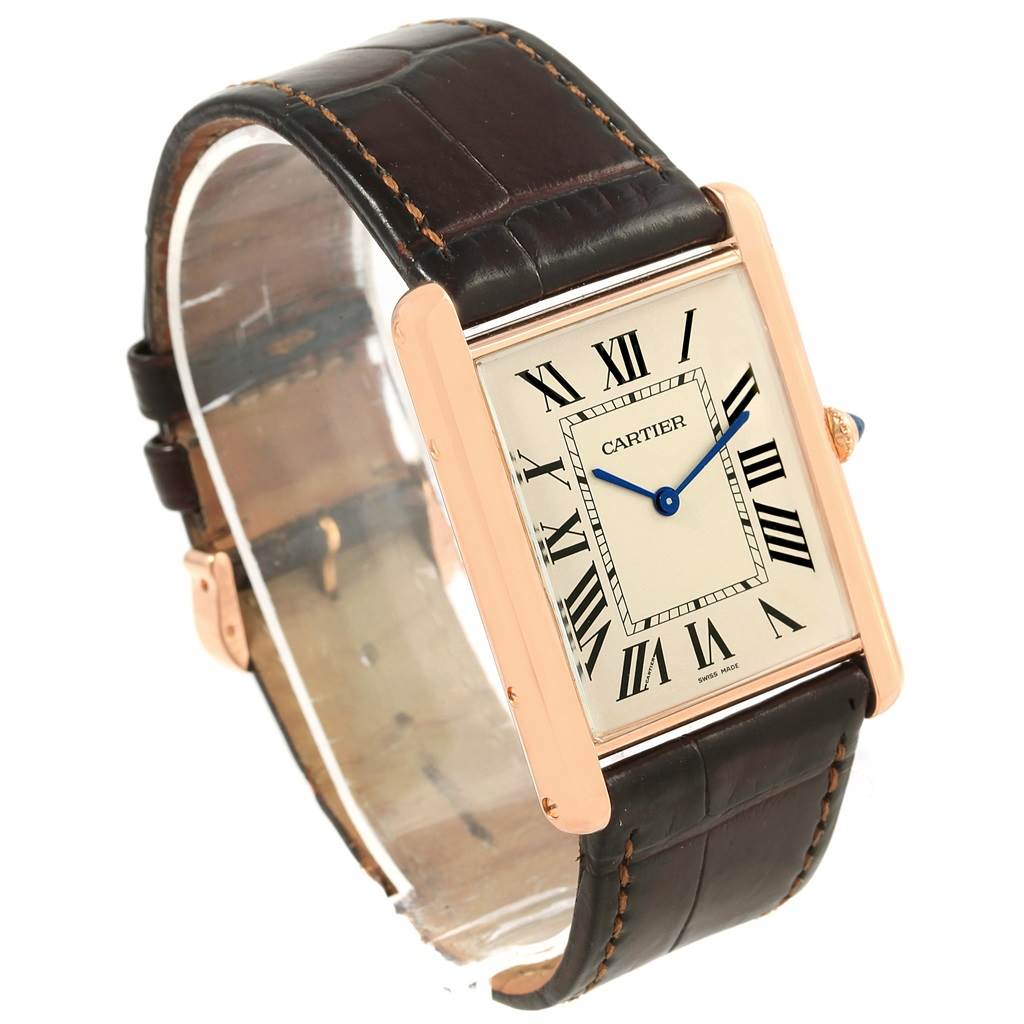 The image shows a Cartier Tank Louis W1560017 Men's Rose Gold Silver Dial W1560017 Men's Rose Gold Silver Dial watch from an angled view, highlighting its face, case, and leather strap.