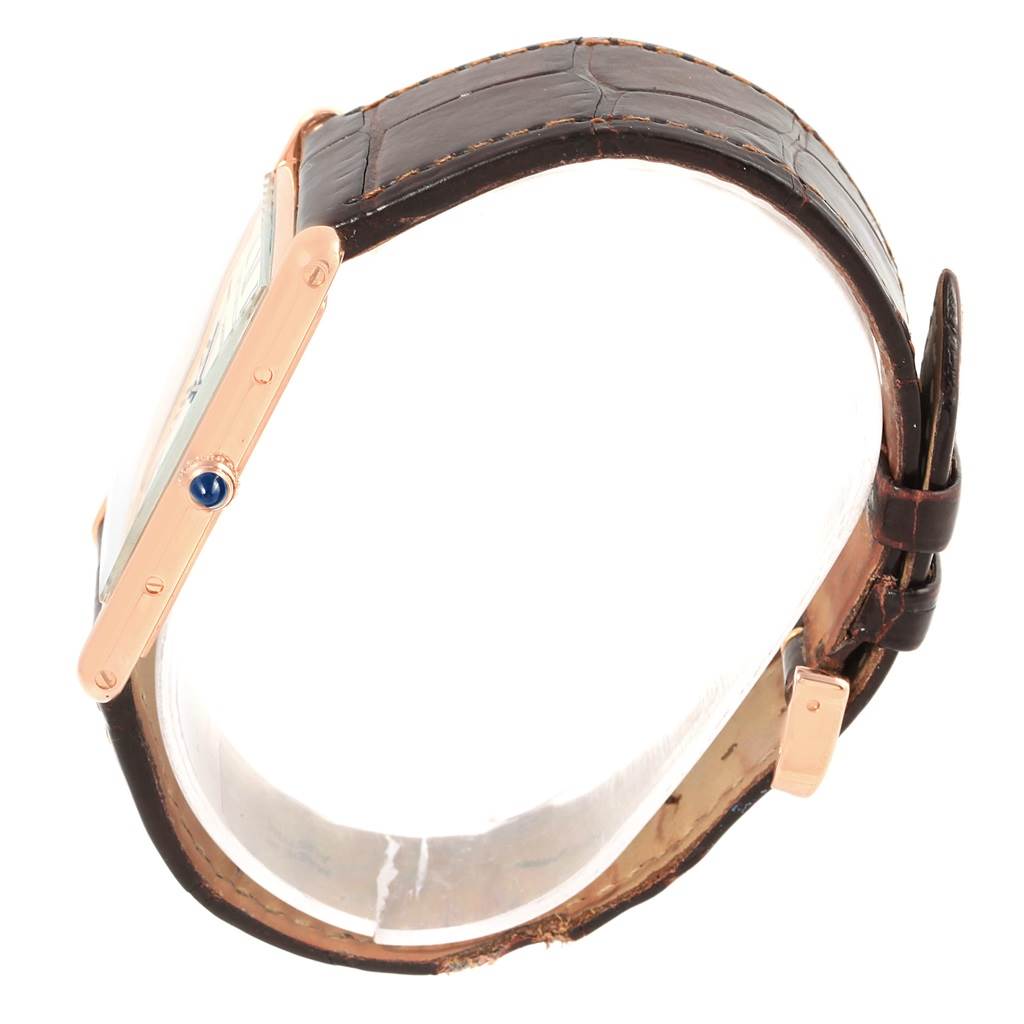 The image shows a side view of the Cartier Tank Louis W1560017 Men's Rose Gold Silver Dial W1560017 Men's Rose Gold Silver Dial model, highlighting the case, crown, and leather strap.
