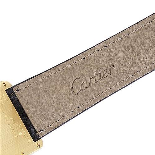 This is a close-up shot of the leather strap with the Cartier logo on a Tank Louis model by Cartier.