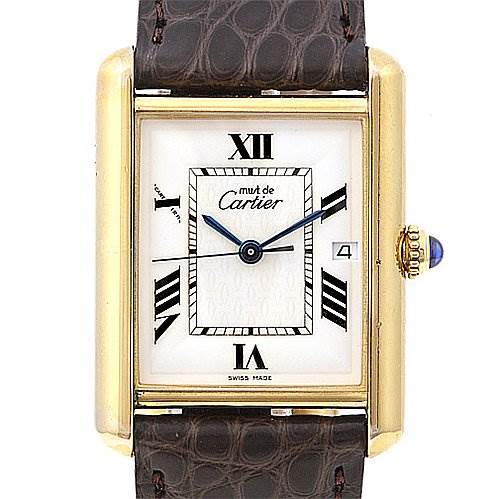 This image shows a frontal view of the Cartier Tank Louis Yellow Gold White Dial Yellow Gold White Dial model watch, highlighting the dial, hands, Roman numerals, and brown leather strap.