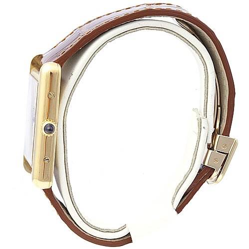 The image shows a side view of a Cartier Tank Louis W1529756 Yellow Gold White Dial W1529756 Yellow Gold White Dial watch, highlighting the bezel, crown, and buckle of the leather strap.