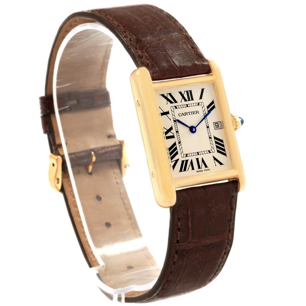 The image shows a Cartier Tank Louis W1529756 Men
s Yellow Gold Silver Dial W1529756 Men
s Yellow Gold Silver Dial watch at an angled view, highlighting its rectangular face, Roman numerals, and brown leather strap.