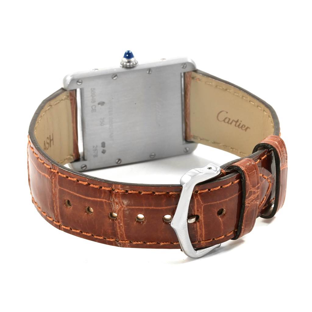 The image shows the back and strap of a Cartier Tank Louis W1540956 Men
s White Gold Silver Dial W1540956 Men
s White Gold Silver Dial watch, focusing on its buckle and rear casing.