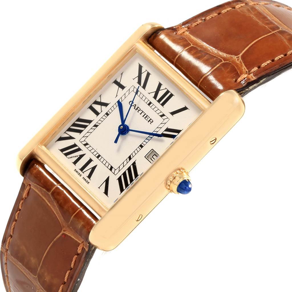 The image shows a close-up, angled view of the Cartier Tank Louis W1529756 Men
s Yellow Gold Silver Dial W1529756 Men
s Yellow Gold Silver Dial watch highlighting its face, crown, and brown leather strap.