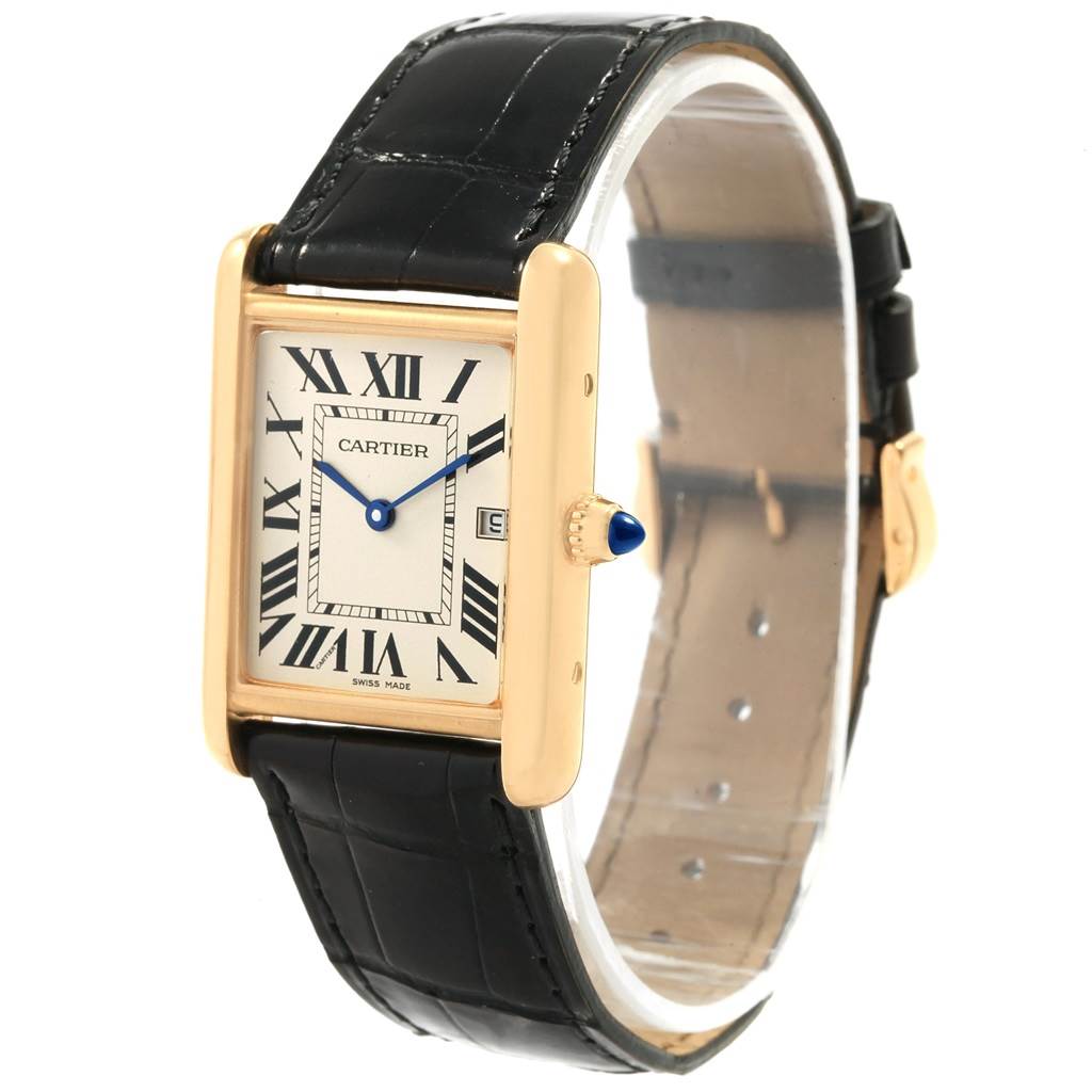 This image shows a Tank Louis Cartier watch at a slight angle, highlighting its rectangular case, Roman numeral dial, crown, and leather strap.