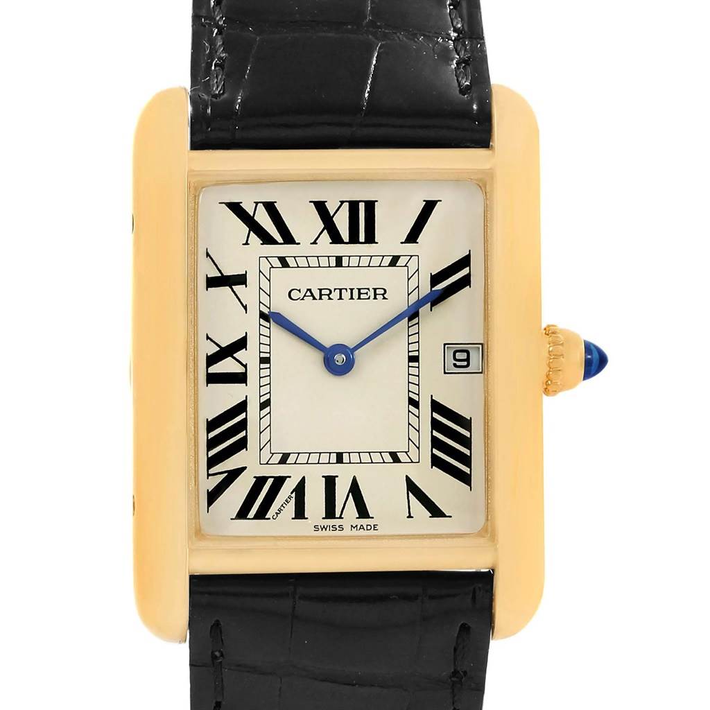 The image shows the face of a Cartier Tank Louis W1529756 Men's Yellow Gold Silver Dial W1529756 Men's Yellow Gold Silver Dial watch, featuring Roman numerals, blue hands, a date window, and a black strap.