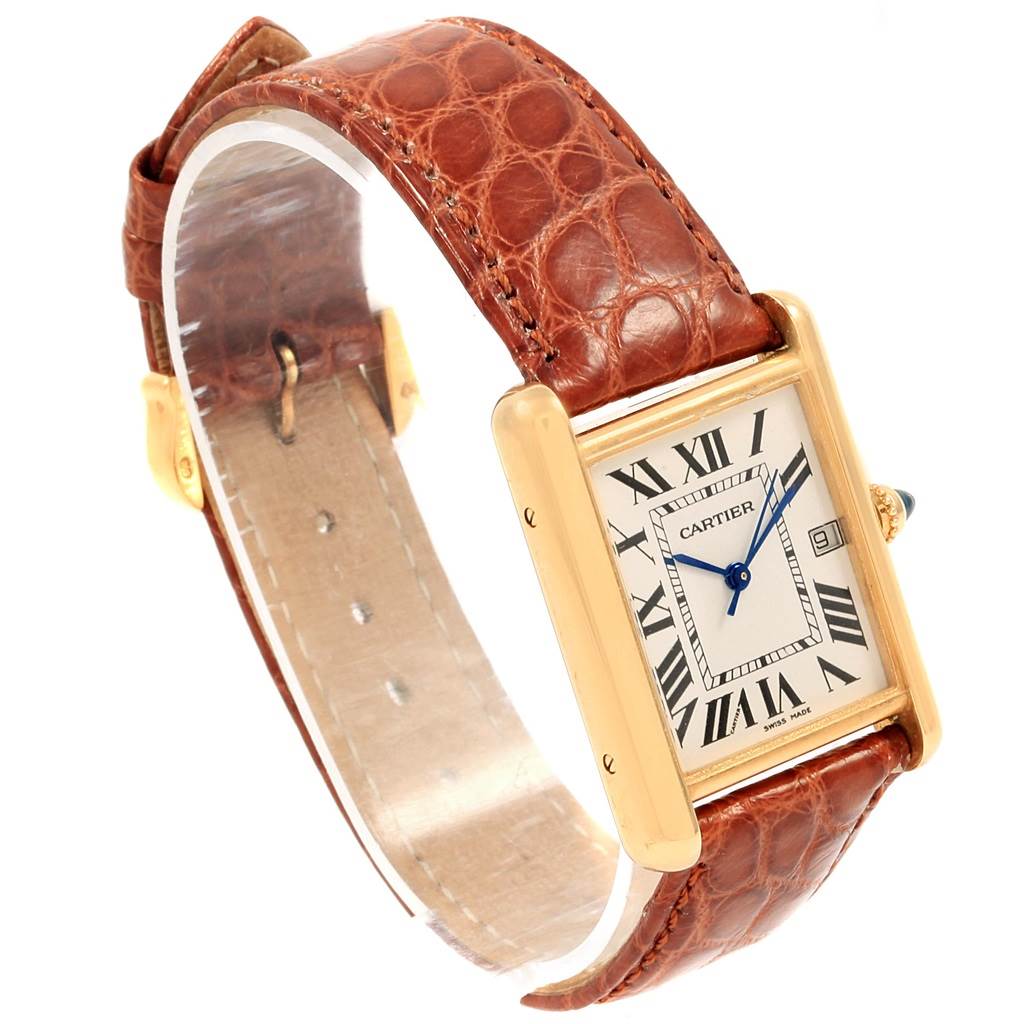 This image shows a Cartier Tank Louis W1529756 Men
s Yellow Gold Silver Dial W1529756 Men
s Yellow Gold Silver Dial model watch at a 3/4 angle, highlighting the dial, hands, case, and leather strap.