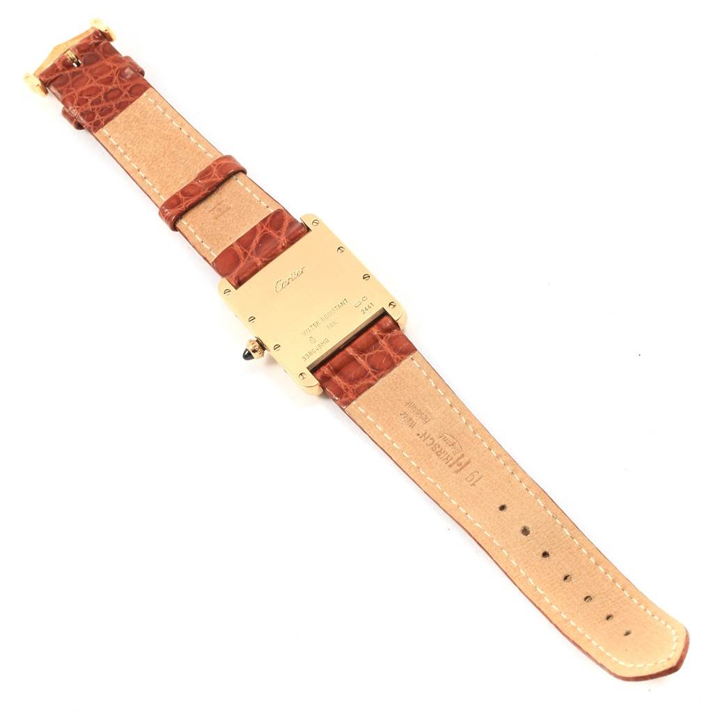 This image shows the back of a Cartier Tank Louis W1529756 Men
s Yellow Gold Silver Dial W1529756 Men
s Yellow Gold Silver Dial watch, highlighting the caseback, crown, and leather strap.