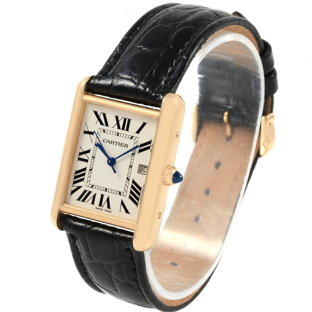 The Cartier Tank Louis W1529756 Men's Yellow Gold Silver Dial W1529756 Men's Yellow Gold Silver Dial watch is shown from a front-left angle, highlighting its rectangular face, crown, and black leather strap.