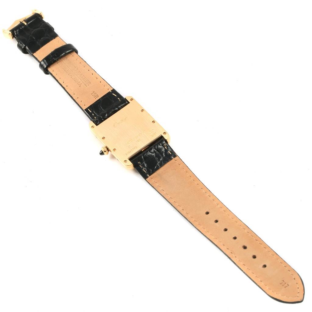 This image shows the back of a Cartier Tank Louis W1529756 Men's Yellow Gold Silver Dial W1529756 Men's Yellow Gold Silver Dial model watch, including the leather strap and case back.