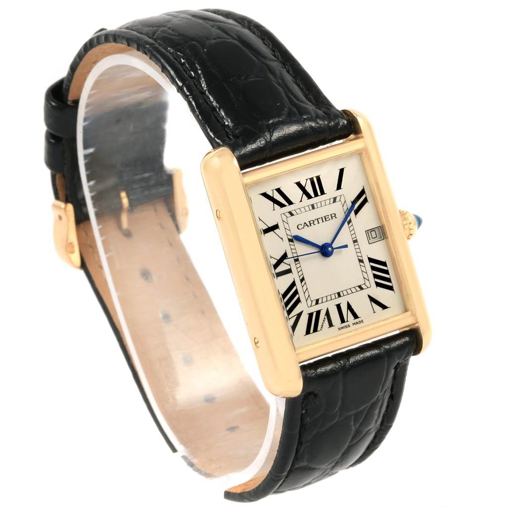 The Tank Louis Cartier watch is shown at a three-quarter angle, displaying the face, case, and leather strap.