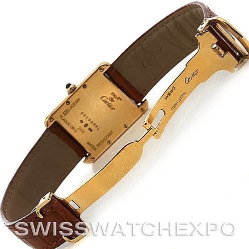 The image showcases the back view and clasp of a Cartier Tank Louis Yellow Gold Beige Dial Yellow Gold Beige Dial watch, with a brown leather strap.