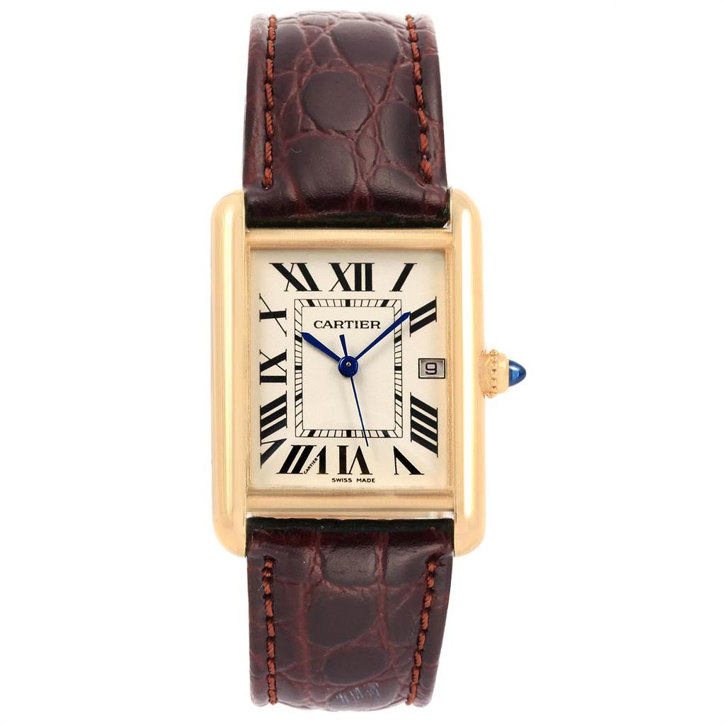 The Cartier Tank Louis W1529756 Men
s Yellow Gold Silver Dial W1529756 Men
s Yellow Gold Silver Dial watch is shown from the front, displaying its brown leather strap, rectangular face, Roman numerals, and blue hands.