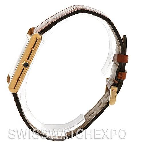 This image shows a side view of the Cartier Tank Louis W1529756 Yellow Gold White Dial W1529756 Yellow Gold White Dial watch, highlighting the case, crown, and leather strap.