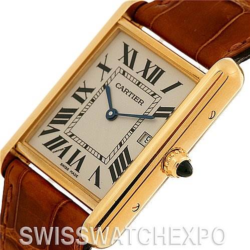 The image shows a close-up of the Cartier Tank Louis W1529756 Yellow Gold White Dial W1529756 Yellow Gold White Dial model at an angle, highlighting the rectangular case, dial, Roman numerals, and crown with a blue cabochon.