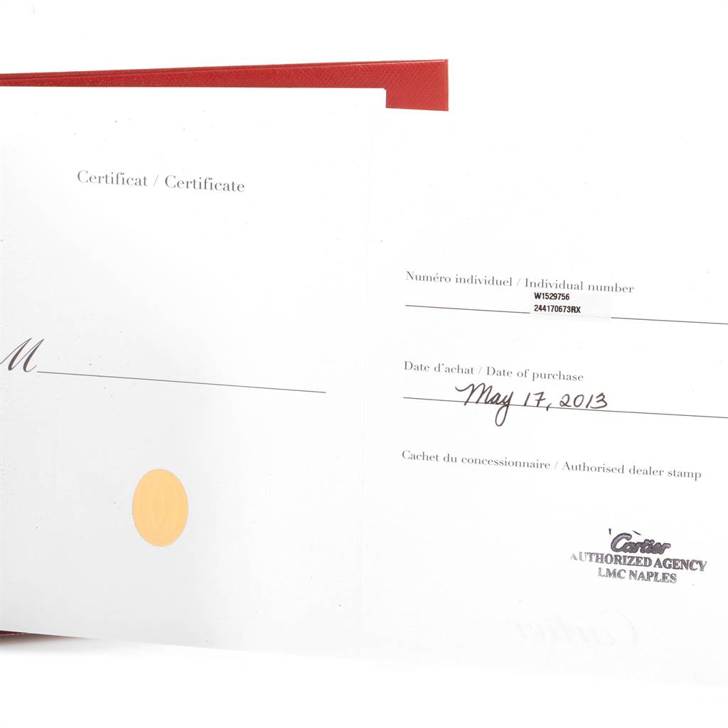 The image shows a Tank Louis model by Cartier's certificate of authenticity, including individual number and purchase date.