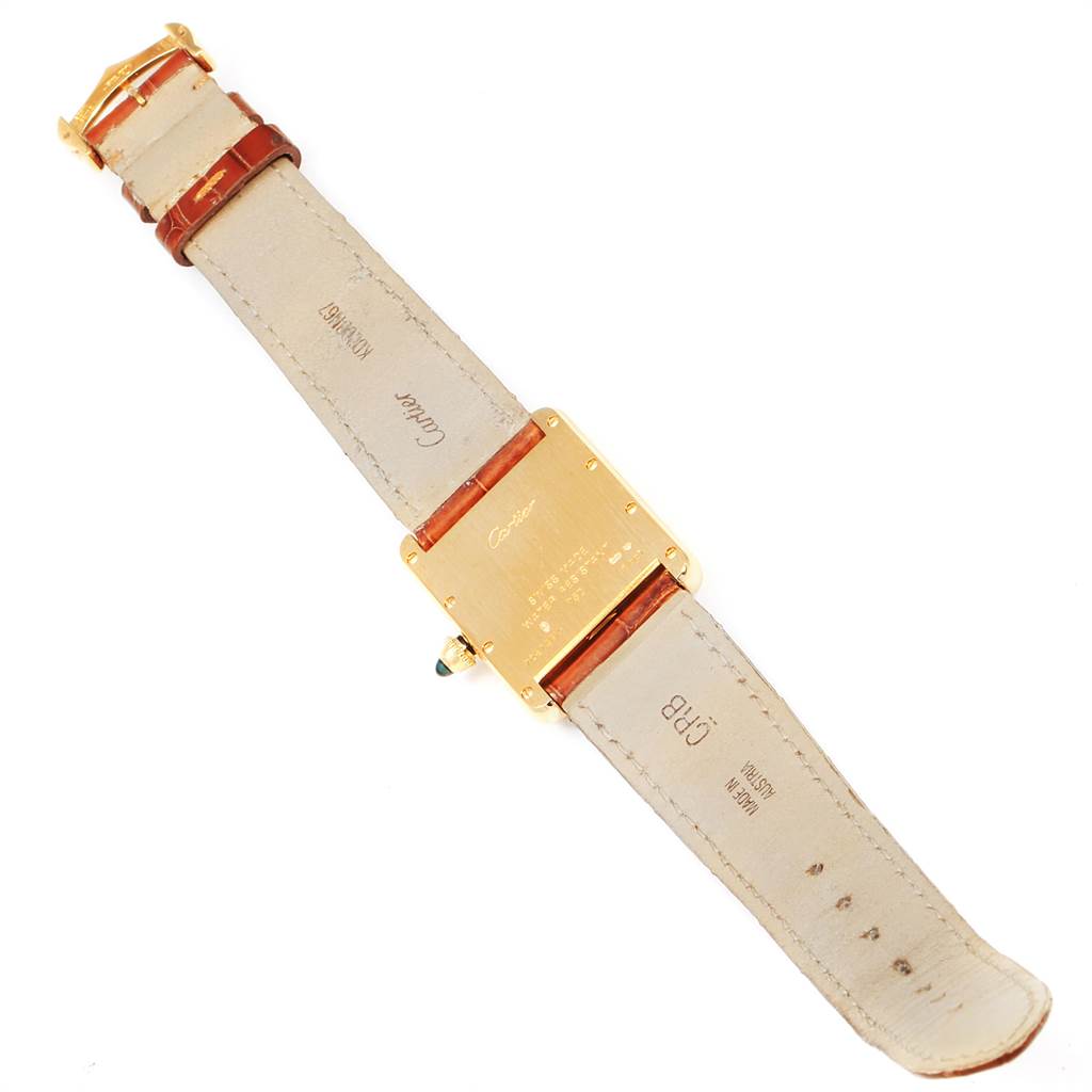 The image shows the back view of a Cartier Tank Louis W1529756 Men's Yellow Gold Silver Dial W1529756 Men's Yellow Gold Silver Dial watch, highlighting the leather strap and engraved case back.