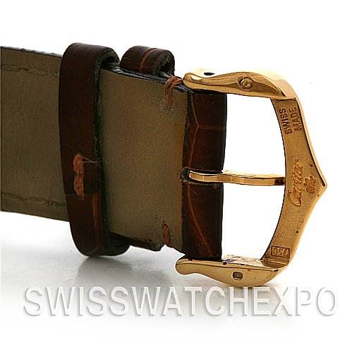 This image shows a close-up of the gold buckle and leather strap of the Cartier Tank Louis W1529756 Yellow Gold White Dial W1529756 Yellow Gold White Dial watch.