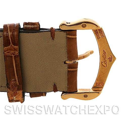 The image shows a close-up view of the buckle and leather strap of a Cartier Tank Louis W1529756 Yellow Gold White Dial W1529756 Yellow Gold White Dial watch from a side angle.