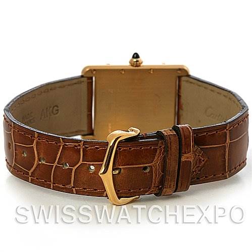 This image shows the Cartier Tank Louis W1529756 Yellow Gold White Dial W1529756 Yellow Gold White Dial model from the back, highlighting the brown leather strap and gold buckle.