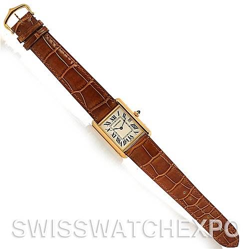 The image shows a top view of a Cartier Tank Louis W1529756 Yellow Gold White Dial W1529756 Yellow Gold White Dial watch, highlighting its brown leather strap and rectangular gold case.