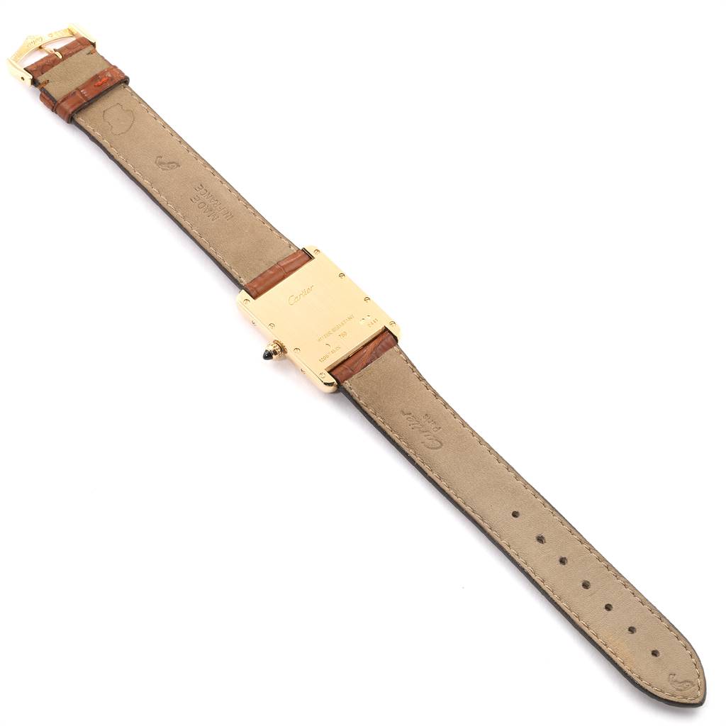 The image shows the backside of a Cartier Tank Louis W1529756 Men's Yellow Gold Silver Dial W1529756 Men's Yellow Gold Silver Dial watch, including the back case and leather straps.