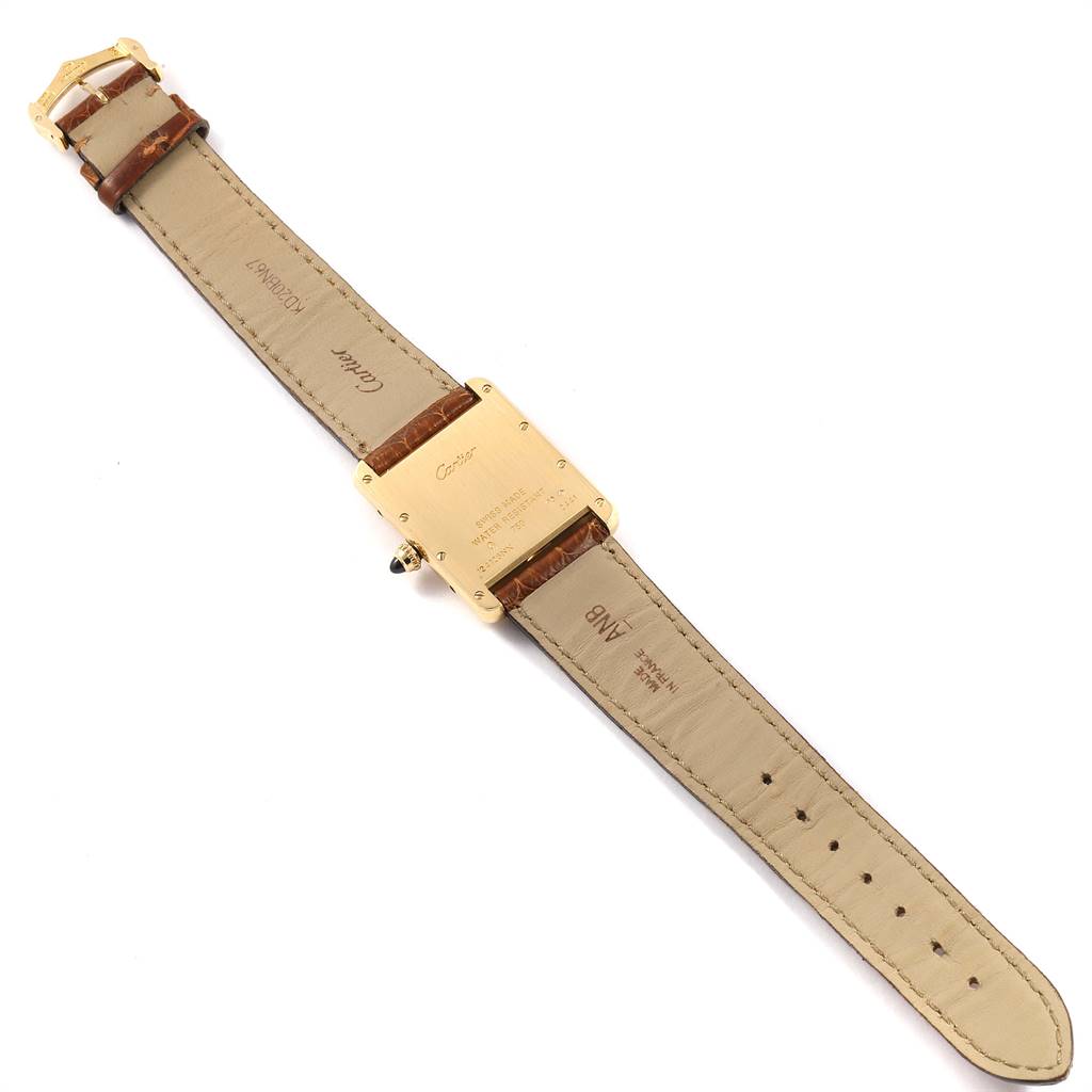 The image shows a Cartier Tank Louis W1529756 Men
s Yellow Gold Silver Dial W1529756 Men
s Yellow Gold Silver Dial model watch viewed from the back, displaying the straps and caseback.