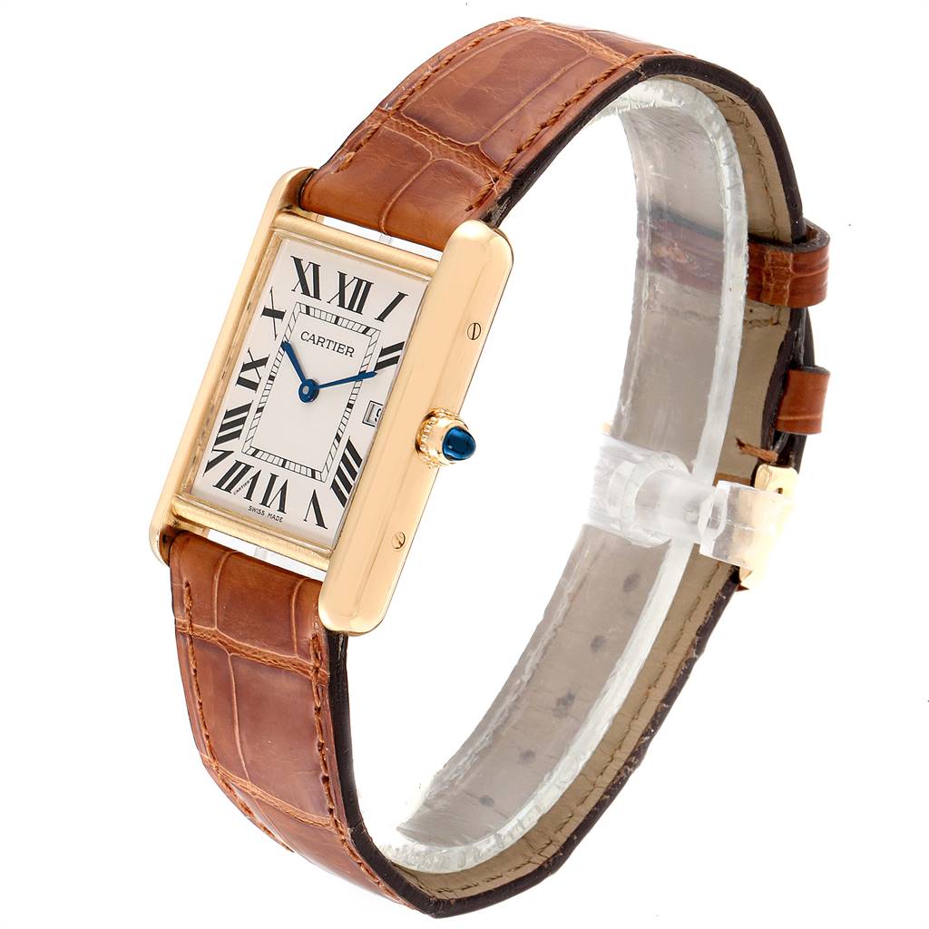 The Cartier Tank Louis W1529756 Men
s Yellow Gold Silver Dial W1529756 Men
s Yellow Gold Silver Dial watch is shown at an angle displaying the face, crown, case, and leather strap.