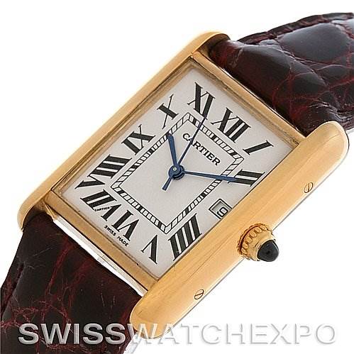 The image shows a Cartier Tank Louis W1529756 Yellow Gold White Dial W1529756 Yellow Gold White Dial watch at a slightly tilted angle, highlighting its face, case, and crown with a leather strap.